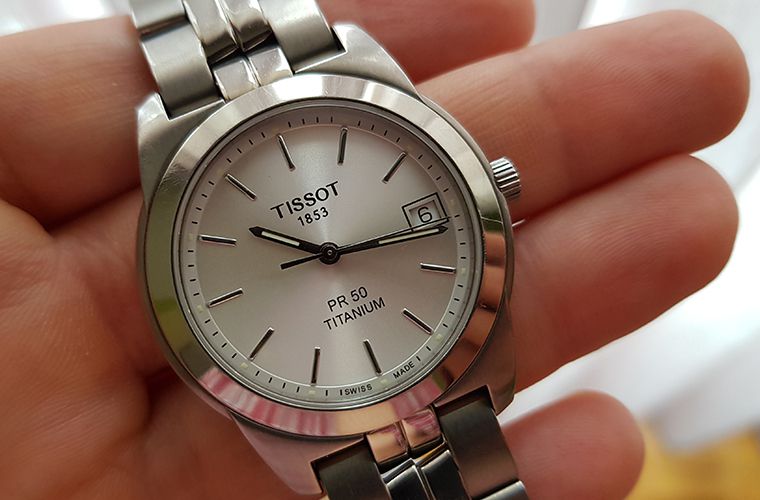 Holding my Tissot PR 50 Titanium