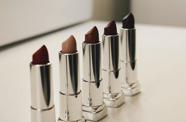 5 lipsticks in various shades of red