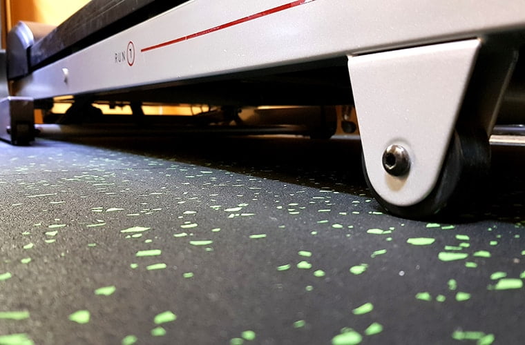 A rubber mat under a treadmill