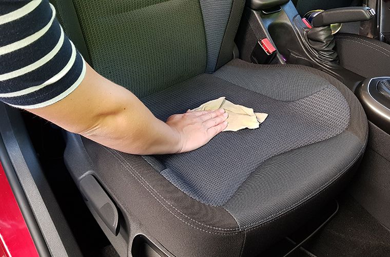 Wiping clean the car seat