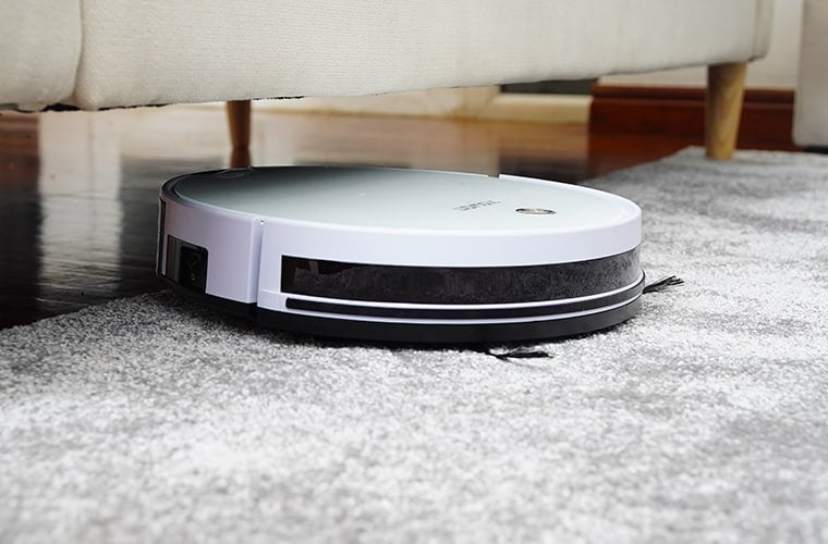 robotic vacuum cleaner under sofa