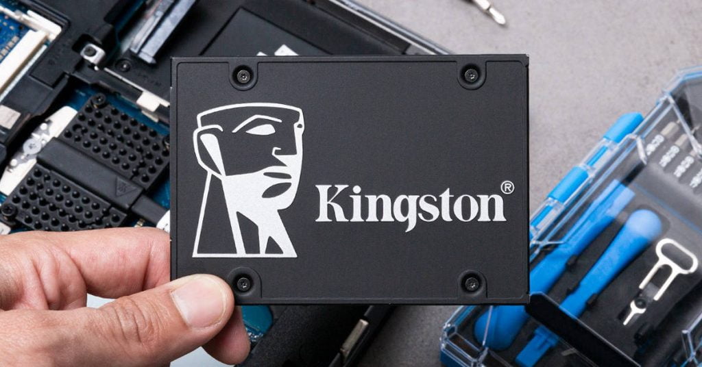Man holding a Kingston SSD