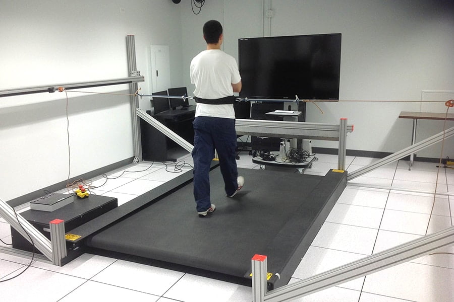 Man walking on a custom built Tuff Tread treadmill