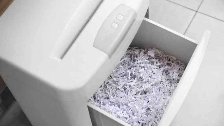 Document shredder with paper shreds - closeup