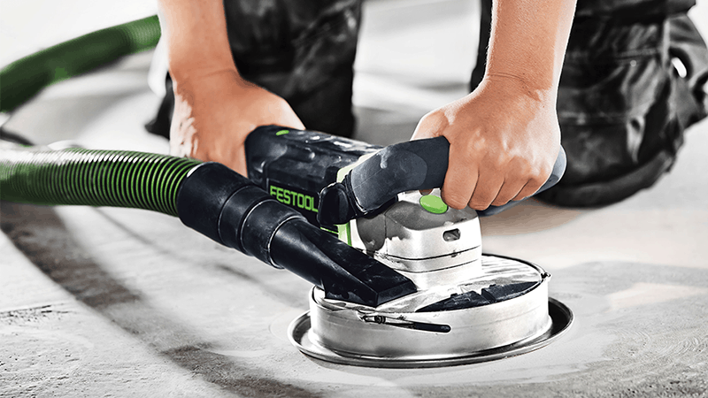 worker using festool power tool