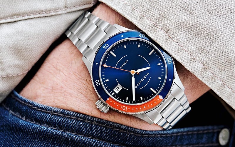 man holding his hand in pocket with a martenero watch on his wrist