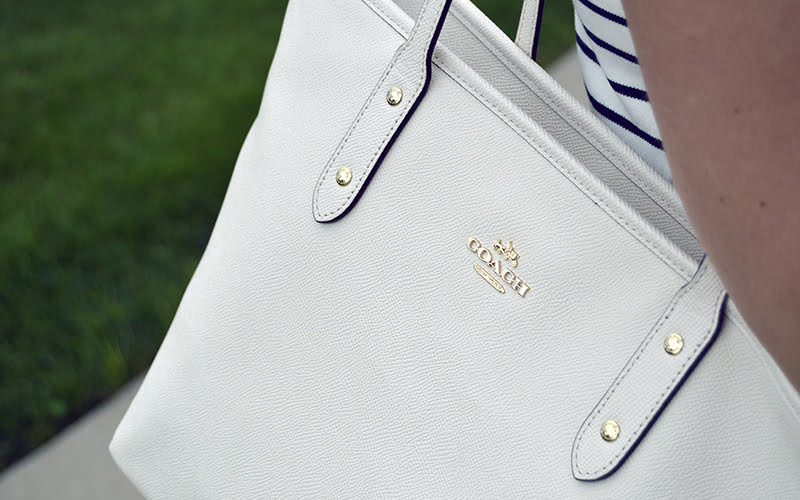 white leather purse
