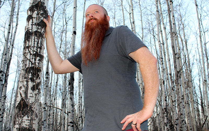 Steven wearing Unbound Merino Merino Polo