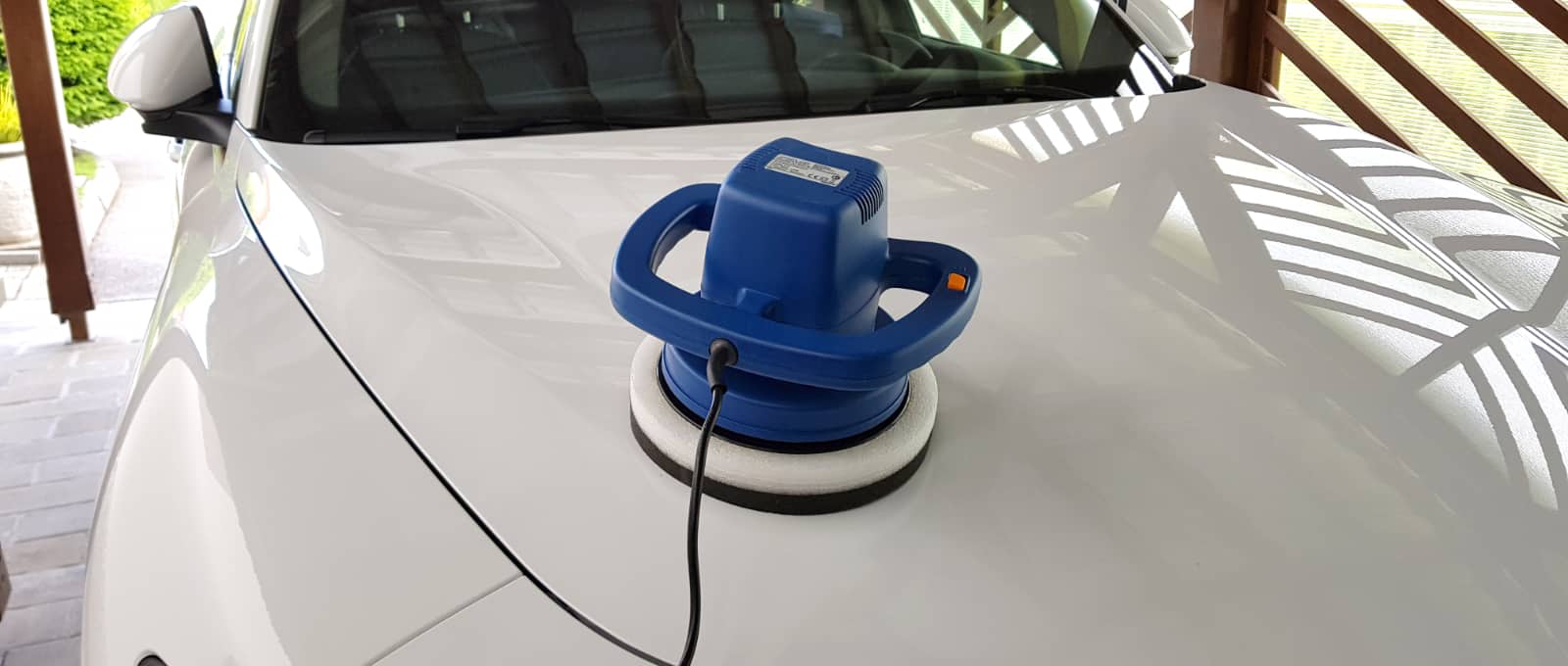 rotary buffer on car hood