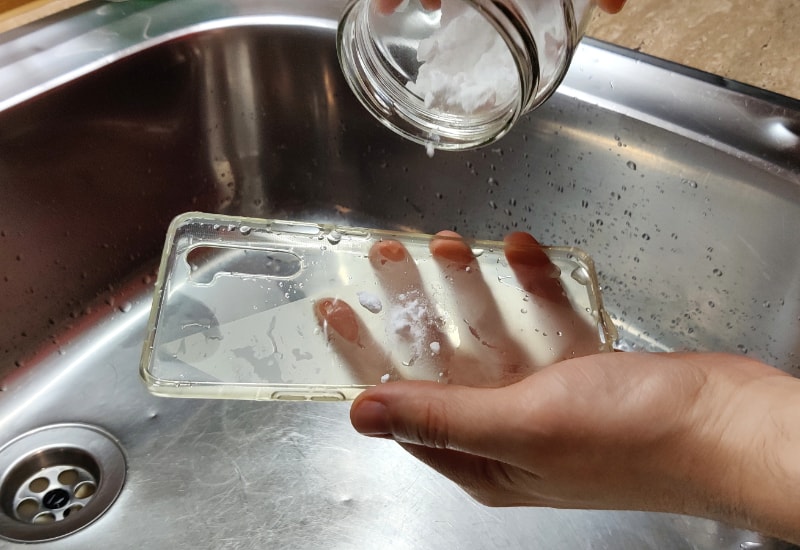 cleaning a clear phone case with baking soda