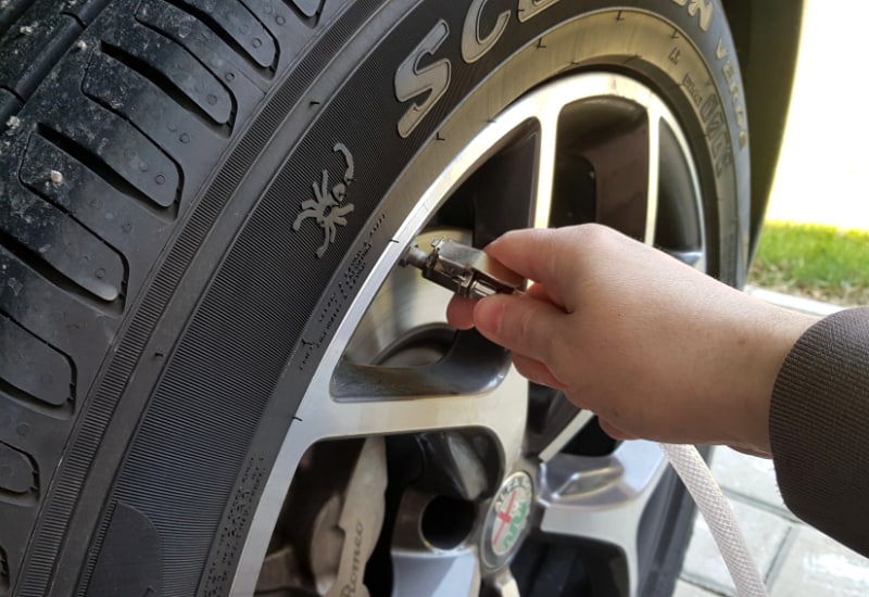 inflating a car tire