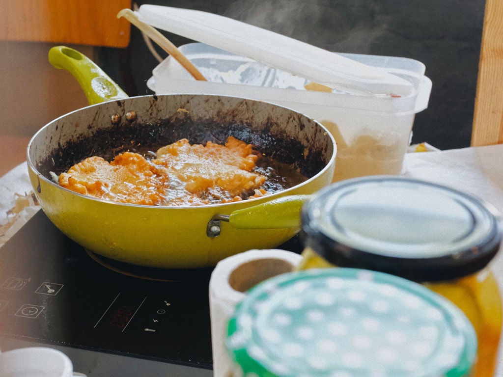 Oily food in dirty pan