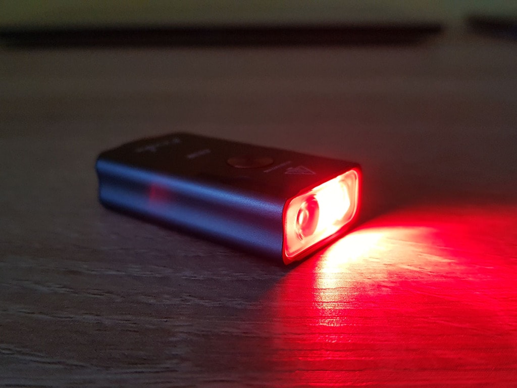 fenix e03r red led light on table