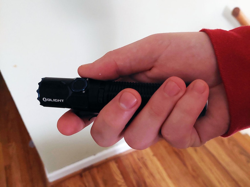 olight warrior 3 in hand