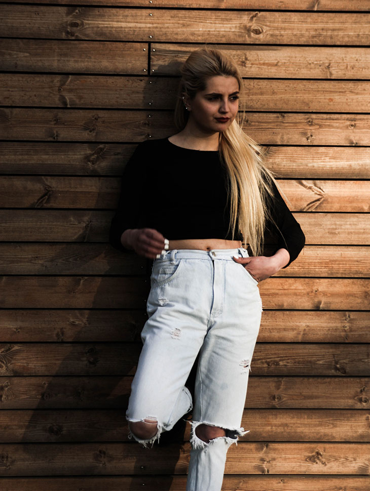 Woman in loose jeans